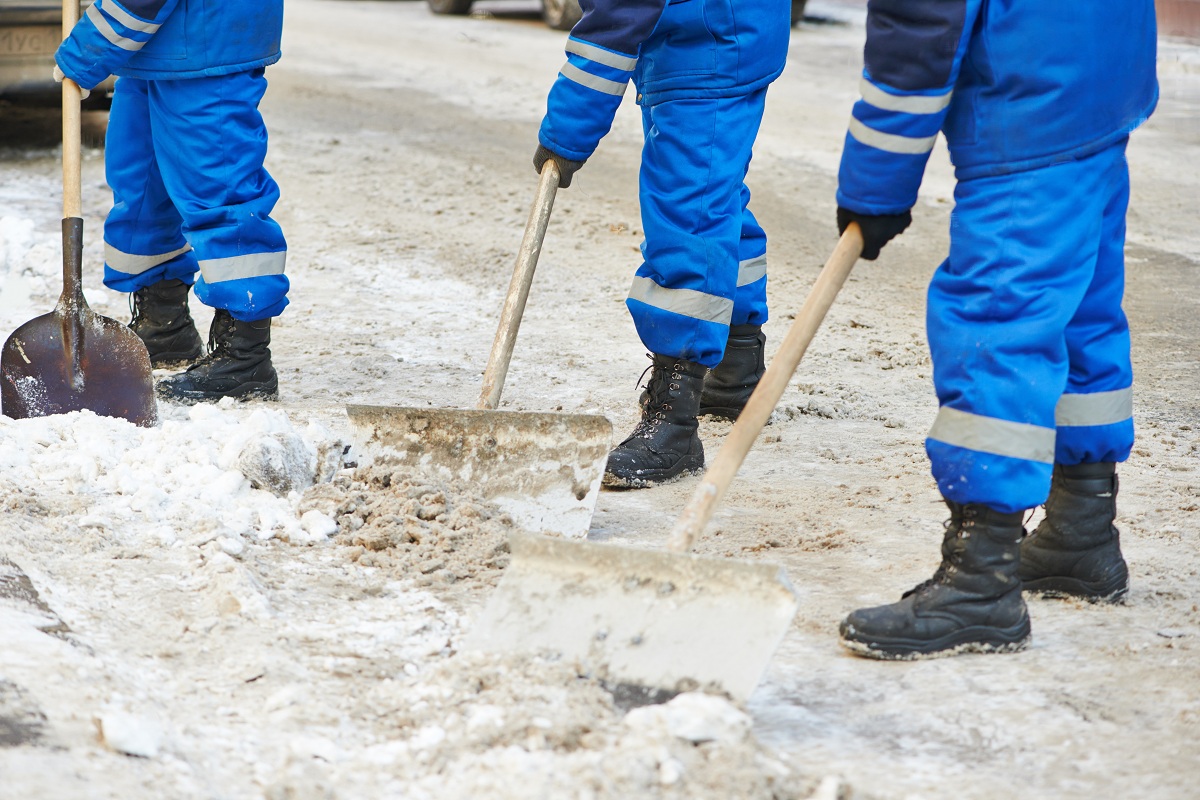 Men shovelling snow