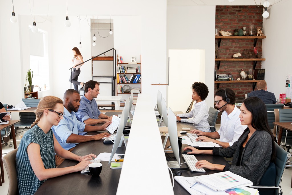 Employees working in an open-plan office