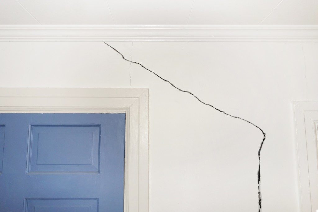 Crack in the wall of a home indicating foundation defects