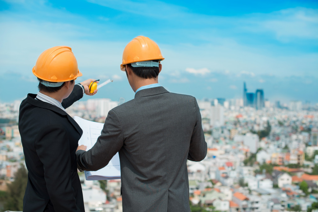 two men with a construction plan