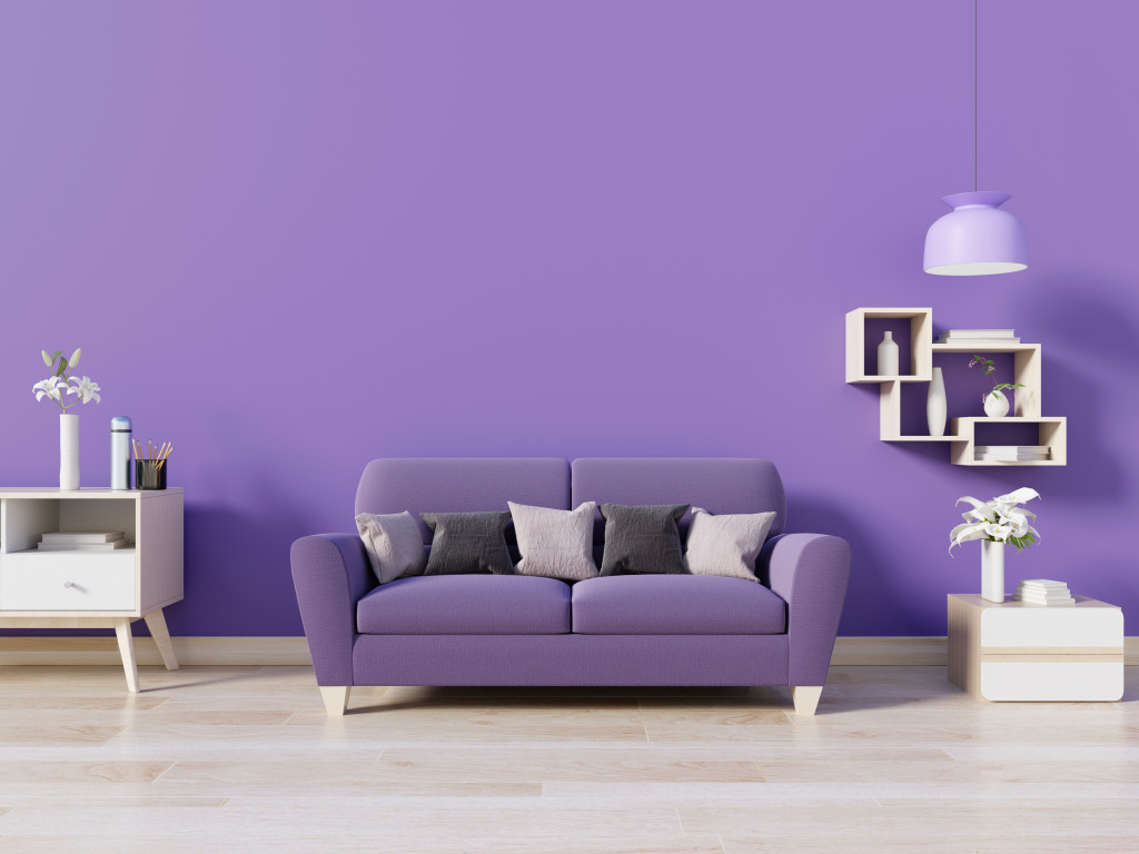 Violet wall and couch in a modern living room